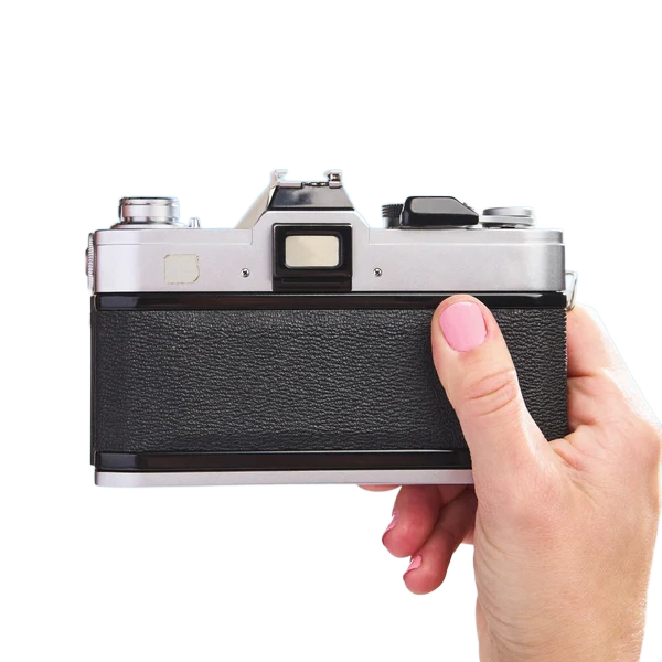Back of a film camera held in a hand